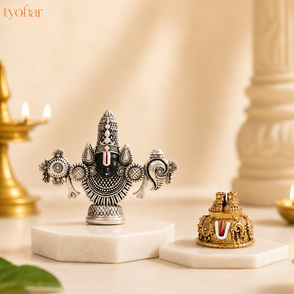 Decorative metal figurines on marble bases with a warm background